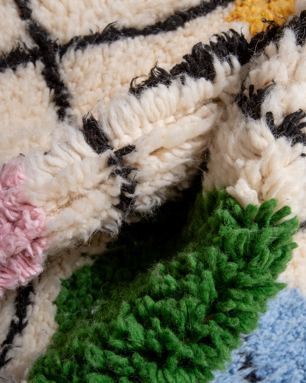 Modern, designer, handcrafted Berber rug from Morocco. Beniourain carpet with beautiful colours and patterns and fluffy wool texture.
